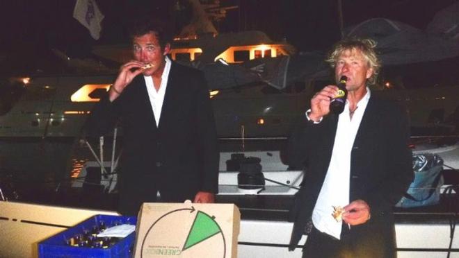 Racing duo enjoy Pizza and a cold beer on arrival in Grenada thanks to Port Louis Marina staff - RORC Transatlantic Race © Louay Habib / RORC